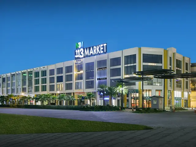 M3M 113 Market – SCO frontage lit up at dusk