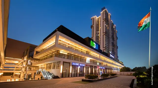M3M Corner Walk – retail block and entrance at dusk