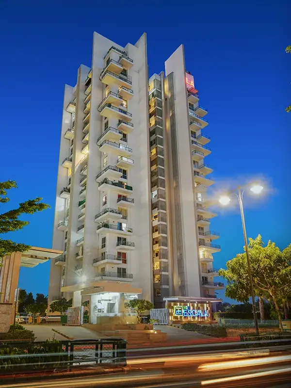M3M Escala – tower and entrance at dusk (actual photograph)