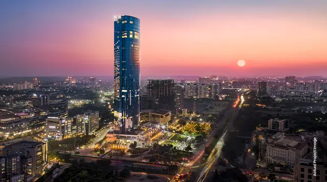 M3M IFC – tower against the Gurugram skyline at sunset (actual photograph)