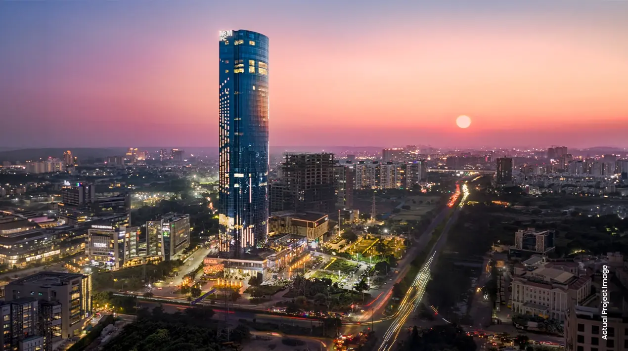 M3M IFC – tower against the Gurugram skyline at sunset (actual photograph)