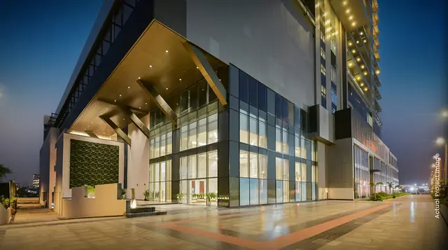 M3M Lofts 74 – entrance and drop-off at night