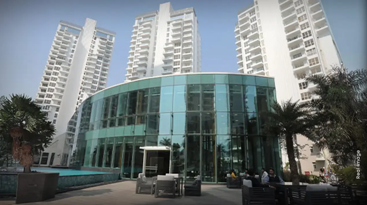 M3M Merlin – glass clubhouse and towers (real image)