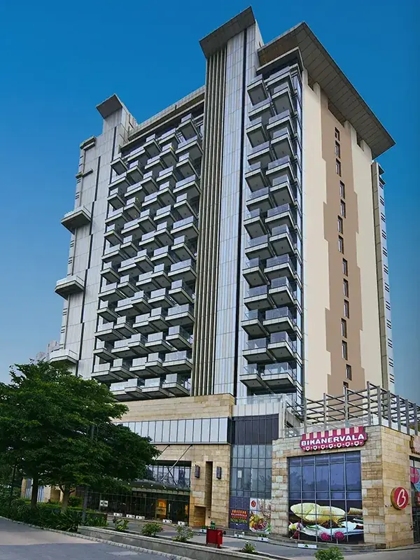 M3M One Key Resiments – tower with ground-floor retail (actual photograph)