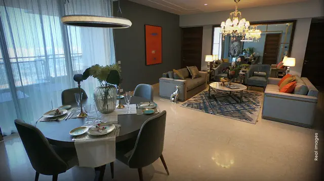 M3M Panorama Suites – dining and living area (real image)