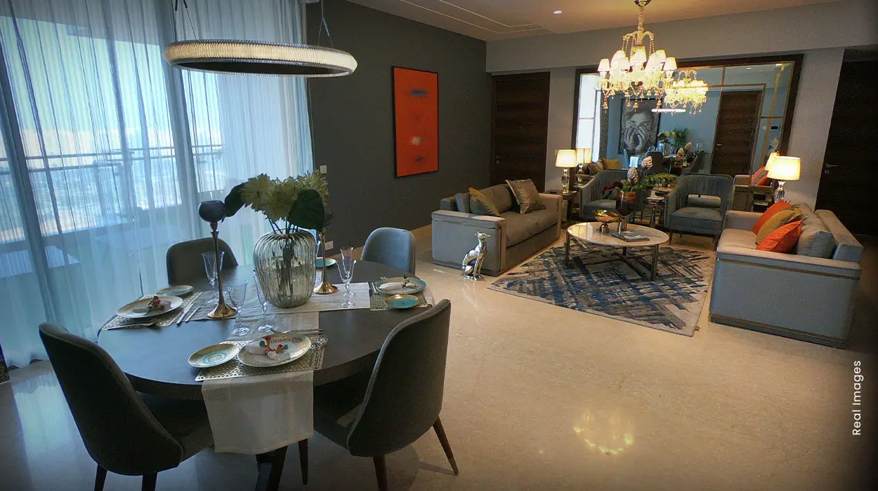 M3M Panorama Suites – dining and living area (real image)