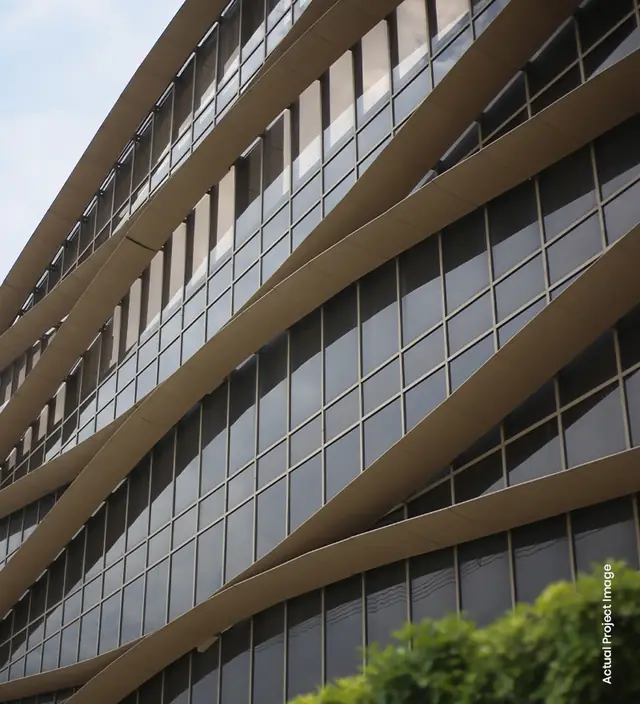 M3M Prive 73 – close-up of the glass and ribbon facade