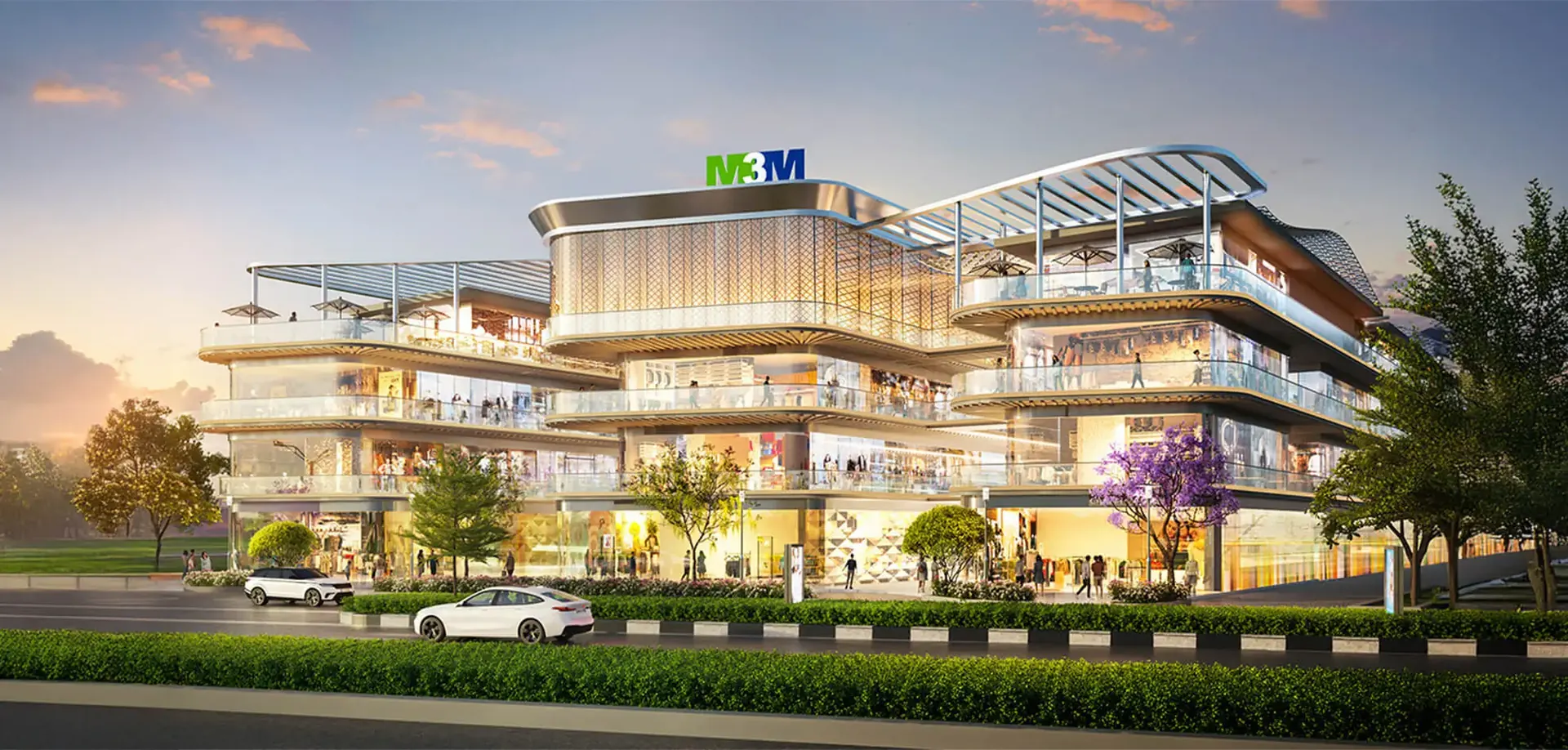 M3M Route65, Sector 65 Gurgaon – four-level retail frontage at dusk (artist's impression)