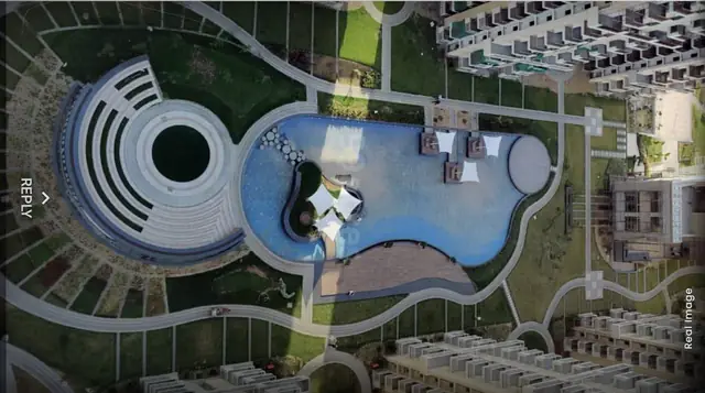 M3M Sierra 68 – bird's-eye view of the clubhouse and pool (actual photograph)