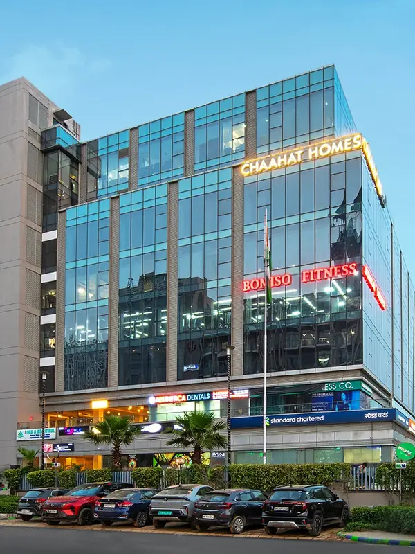 M3M Tee Point – glass-fronted office block with ground-floor retail (actual photograph)