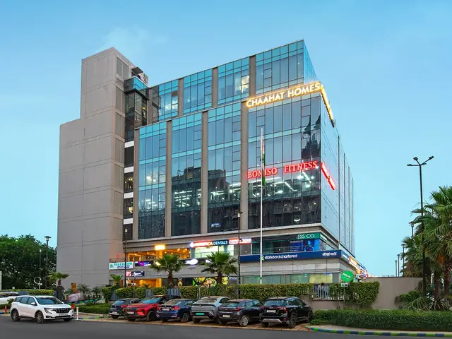 M3M Tee Point – glass-fronted office block with ground-floor retail (actual photograph)