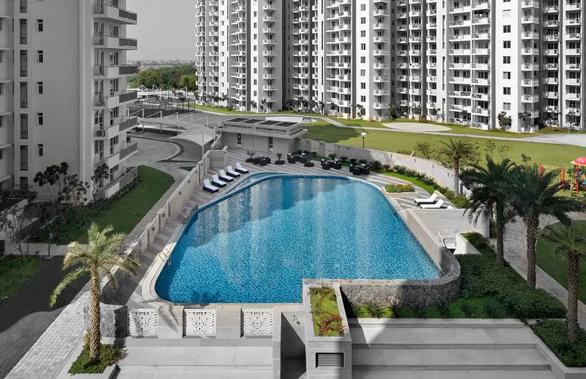 M3M Woodshire – pool deck and landscaping (actual photograph)