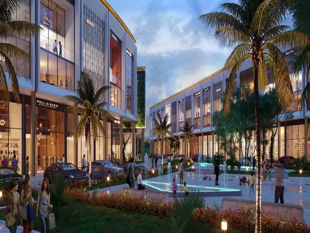 M3M Xpressway 114 – shopfronts and plaza fountain at dusk (artist's impression)