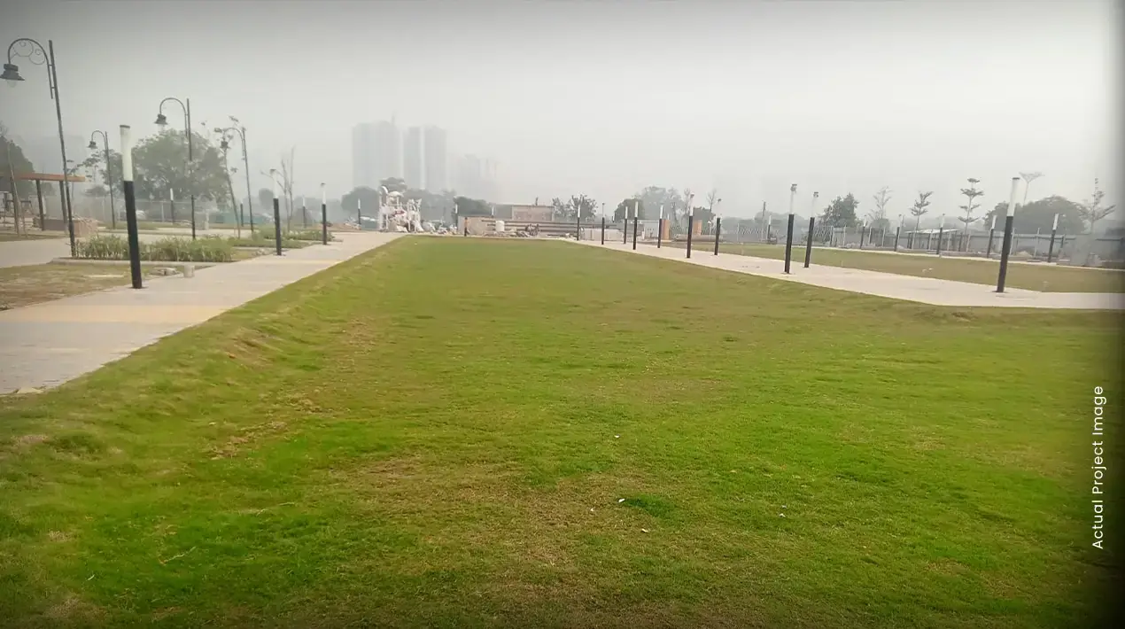 M3M Xpressway 114 – central green and walkways on site (actual photo)
